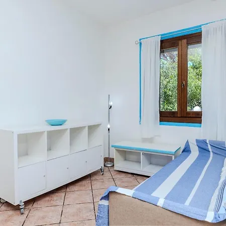 Apartment Beachfront -private Garden And Tavolara Views